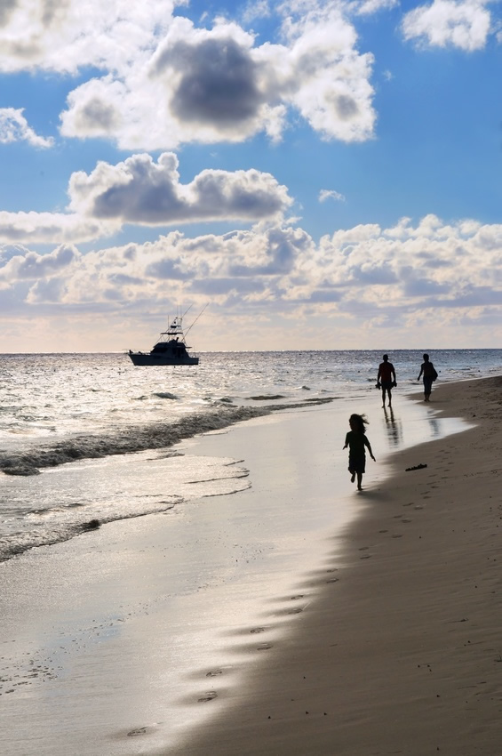 Children running on beach in El Golfo de Santa Clara