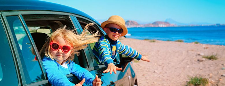 Kids in Car on Beach