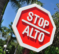Stop / Alto street sign