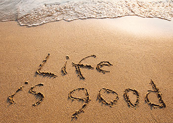 Life is Good written in the sand on a Mexican beach